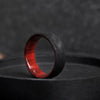 Forged Carbon Fiber and Redheart Wood Wedding Ring.
