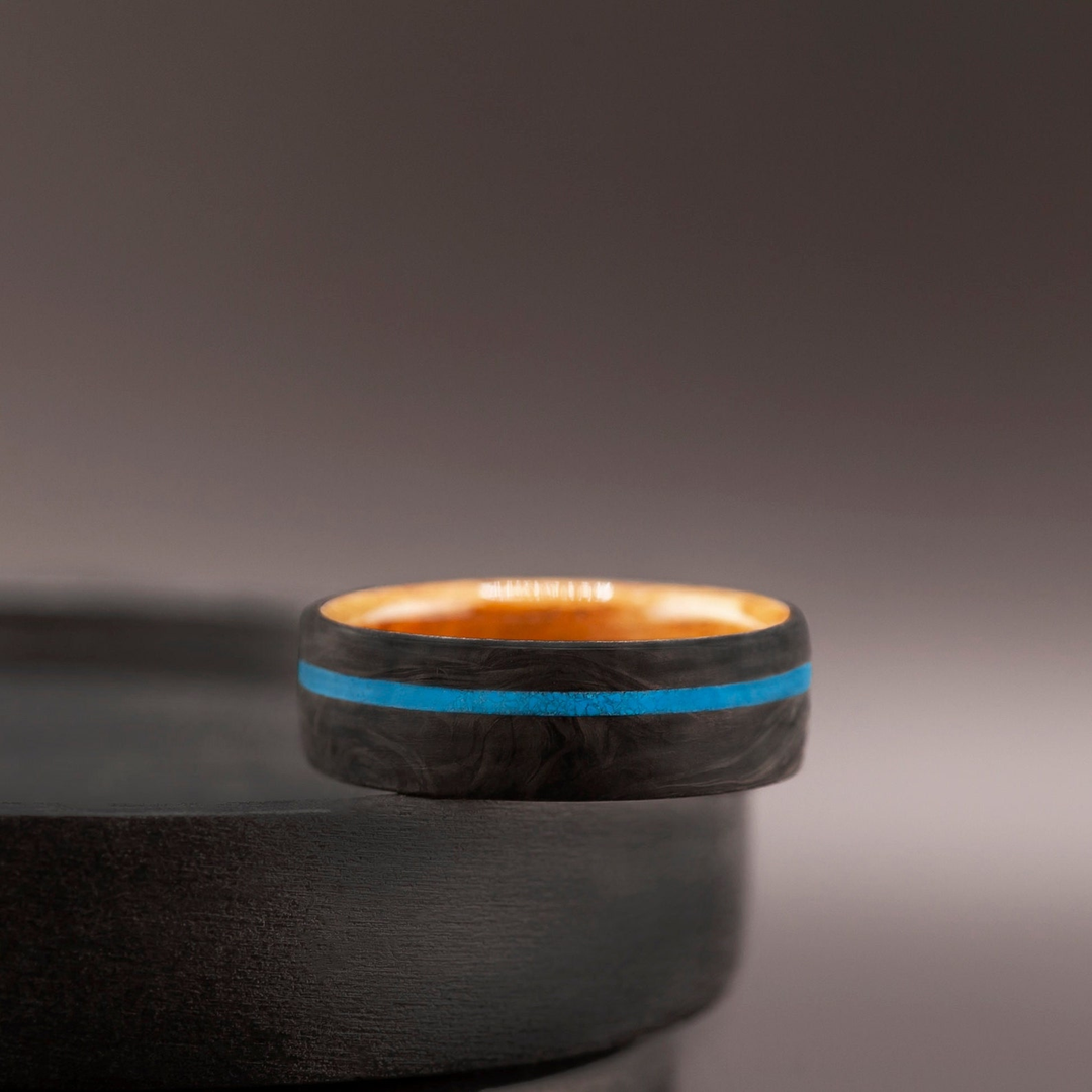 Handmade men’s wedding band with turquoise inlay