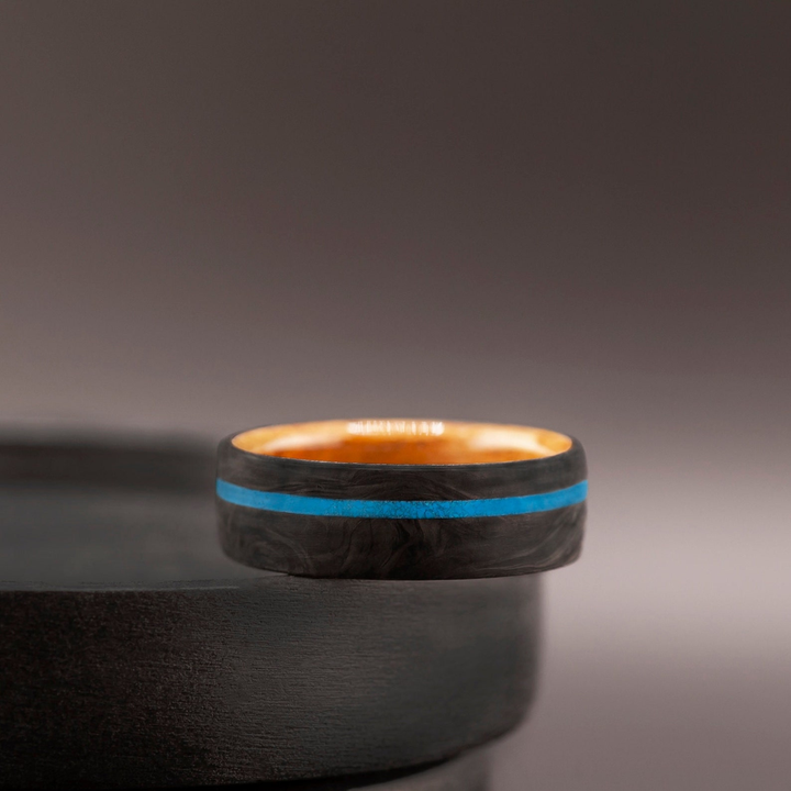 Handmade men’s wedding band with turquoise inlay