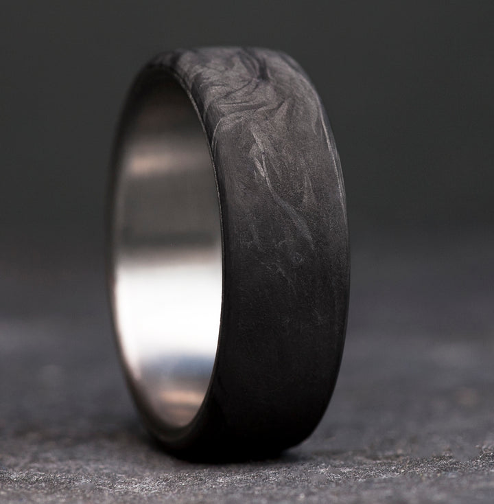 Mens titanium forged carbon fiber wedding band - marbled black surface - handcrafted ring