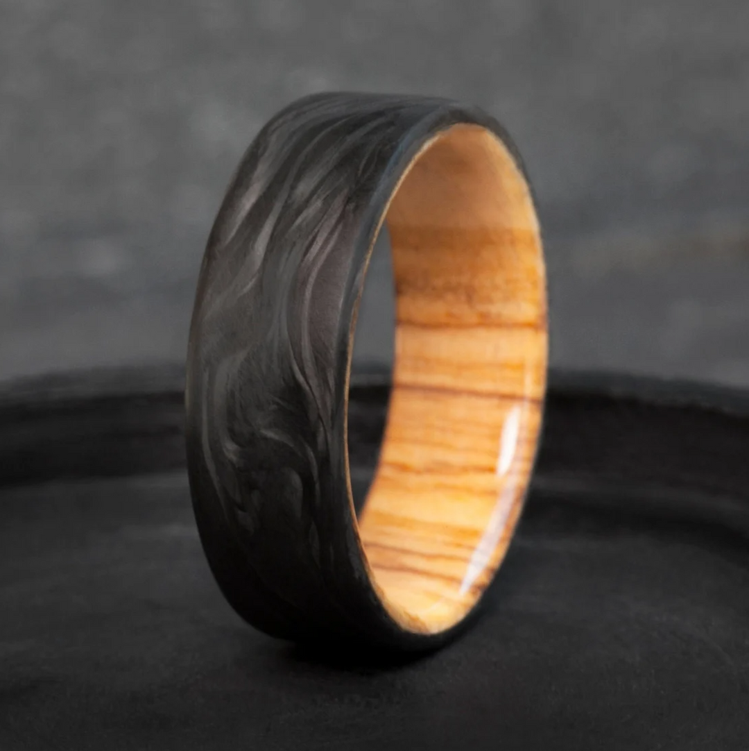 Mediterranean olive wood with forged carbon fiber