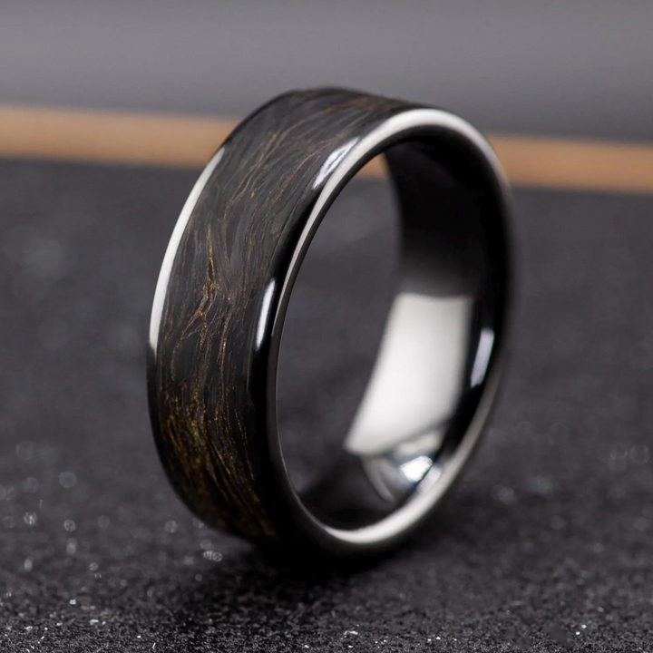 Black ceramic ring with gold leaf