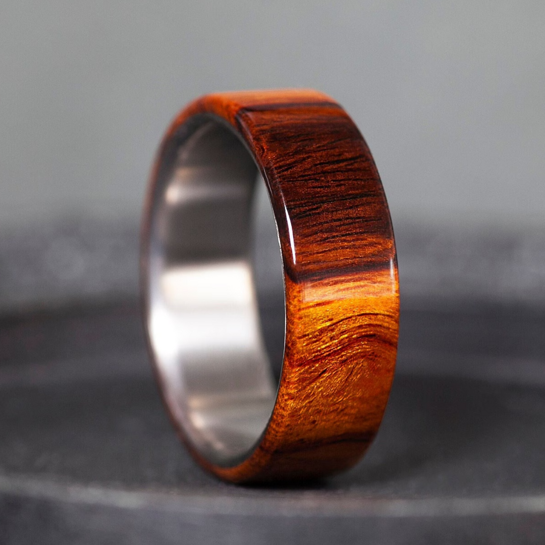 Handmade wedding ring built with an ironwood exterior shaped over a titanium core