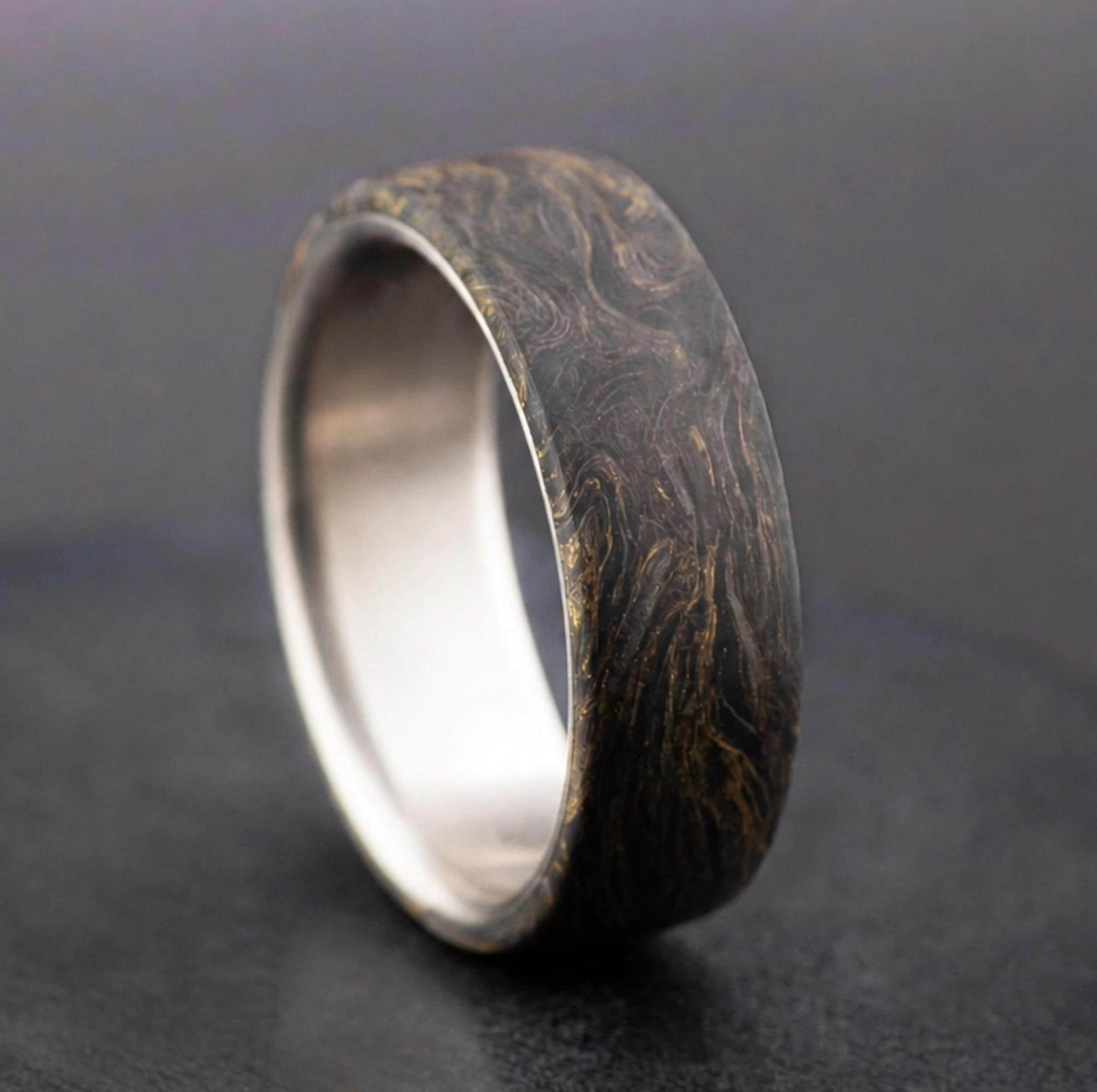 Titanium mens wedding band with forged carbon fiber and gold leaf inlay, domed profile