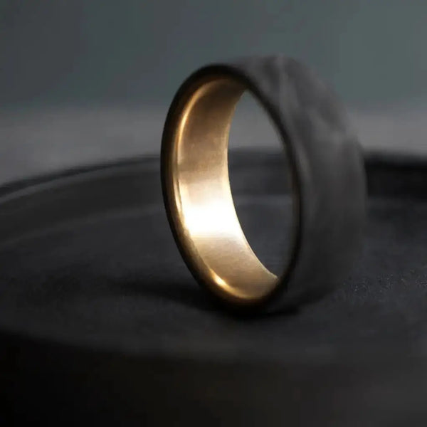 Carbon Fiber Ring with Brass Core.