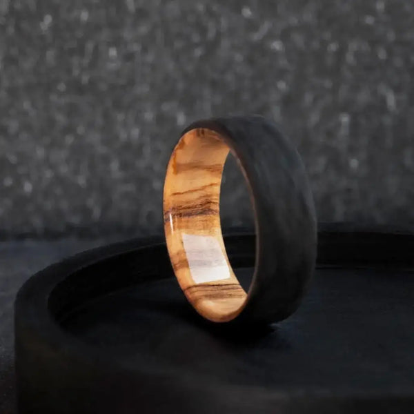 Handmade Carbon Fiber and Olive Wood Wedding Ring.